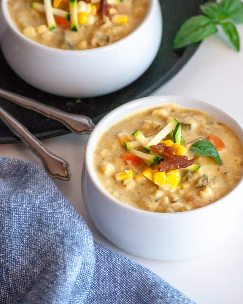 Creamy Corn and Zucchini Chowder with Tempeh Bacon Crumbs & Caramel