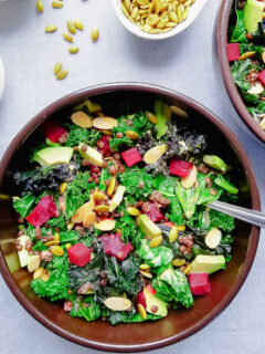 Bowl of Roasted Beet, Kale and Lentil Salad with Golden Dressing, Avocado, Toasted Almonds and Pepitas with Golden Dressing