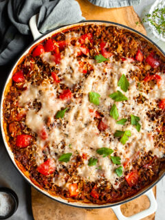 White baking dish of unstuffed peppers