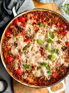 White baking dish of unstuffed peppers