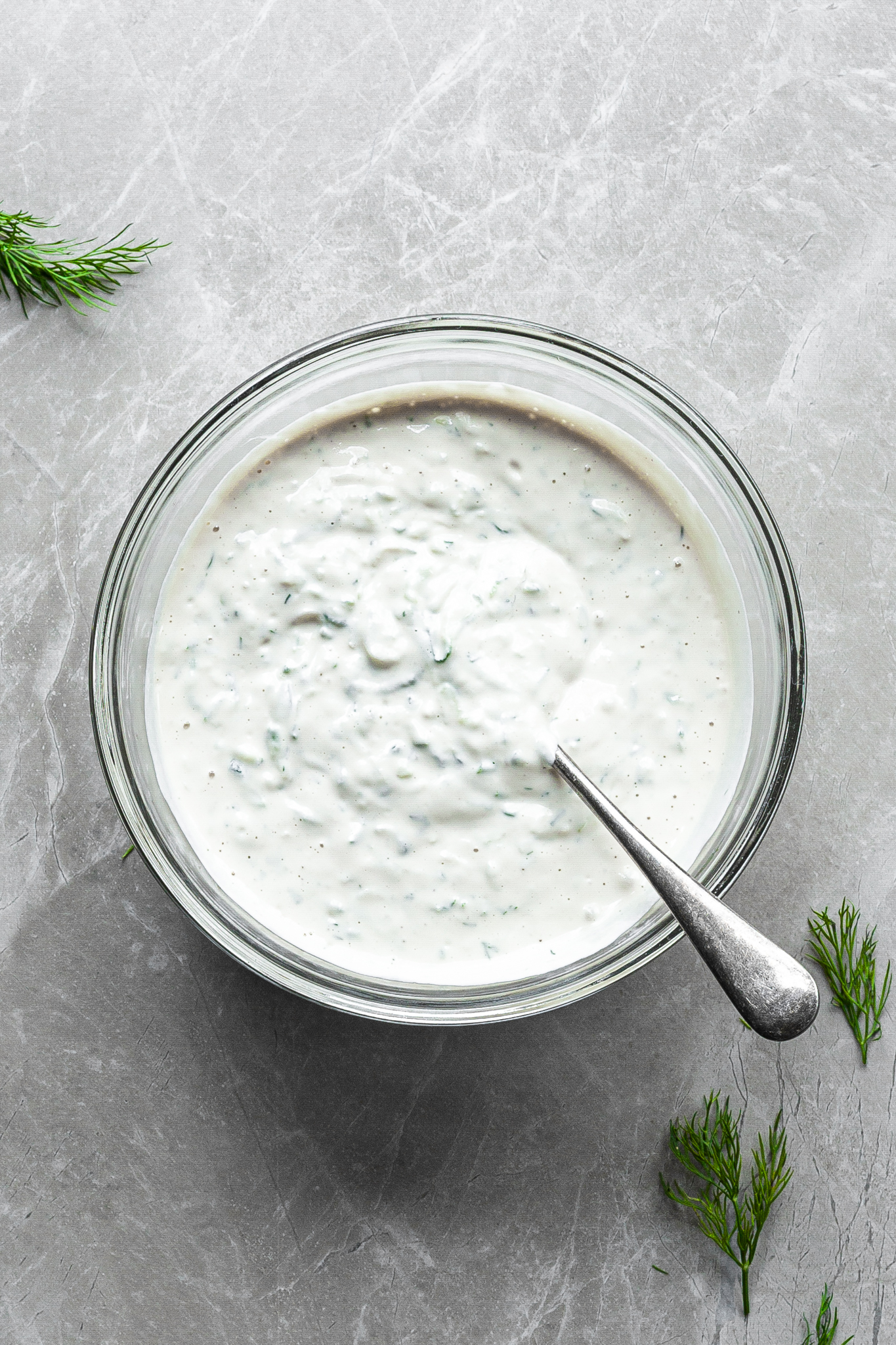 Bowl containing freshly made vegan tzatziki