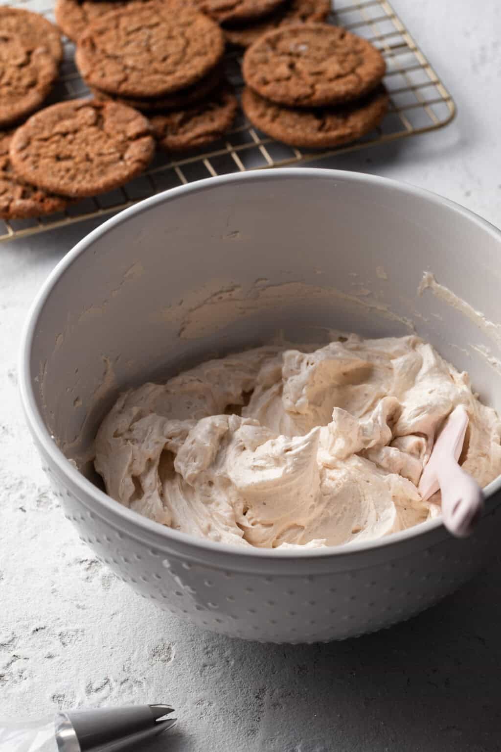 Vegan Chewy Molasses Sandwich Cookies with Eggnog Frosting Crumbs